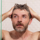 Image for article titled Man Mid-Shower Facing Grim Realization He’ll Have To Retrieve Face Wash He Left On Sink